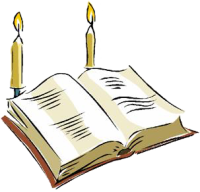 A bible with two candles